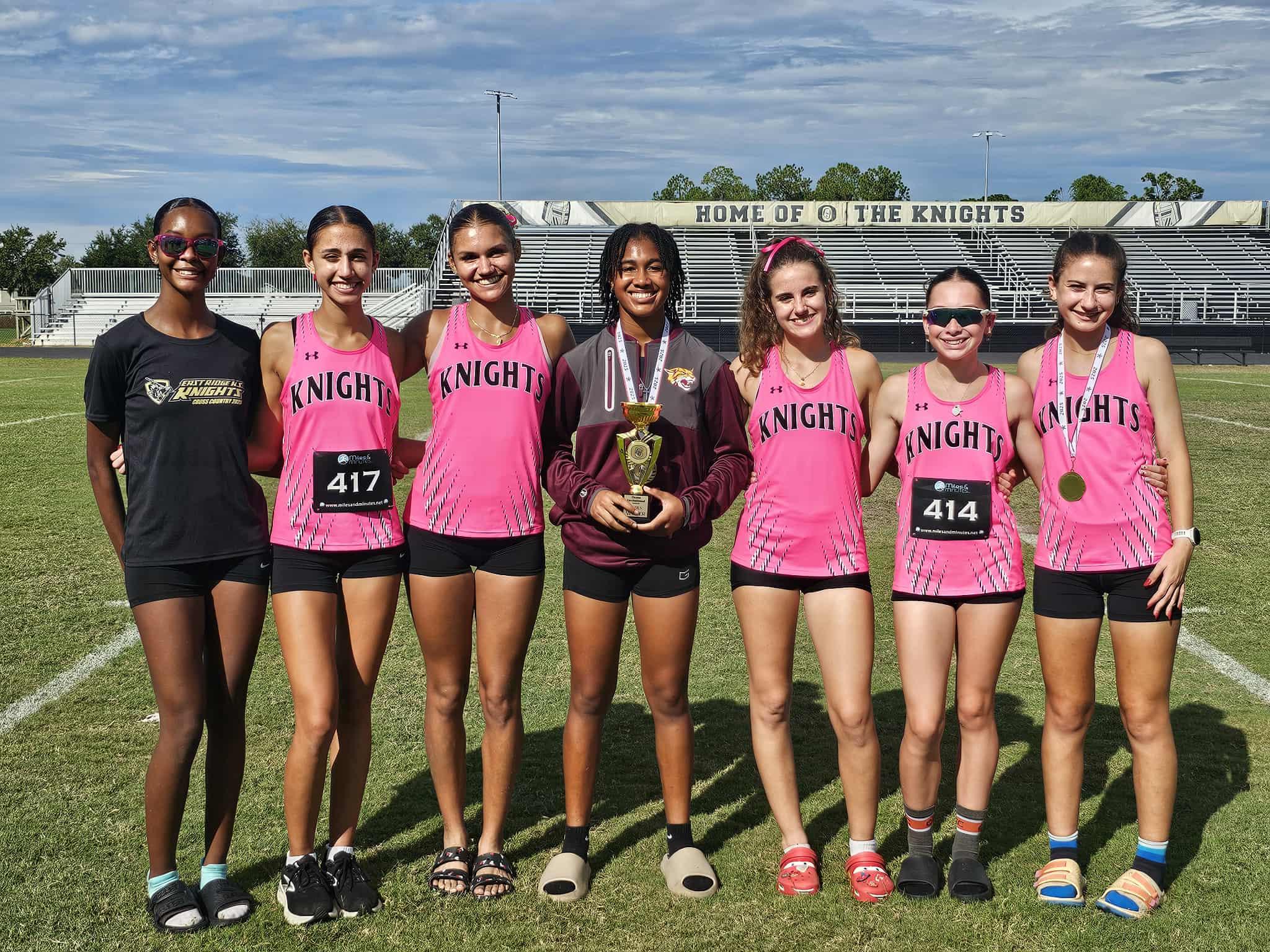Varsity team with championship trophy