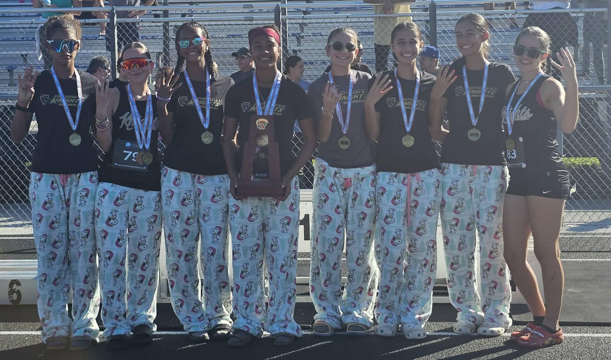 Varsity with team trophy