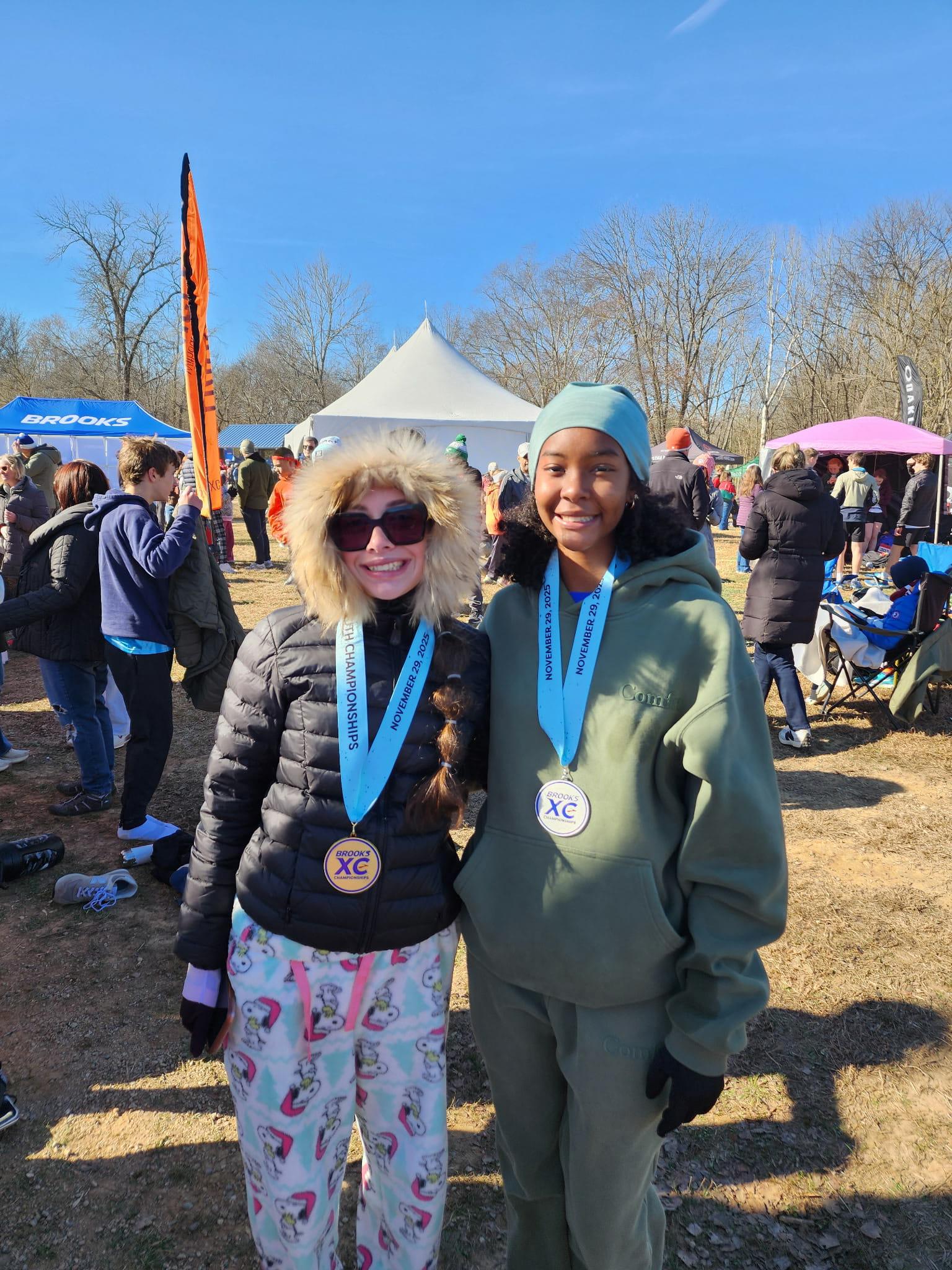 Hortance and Taylor w medals